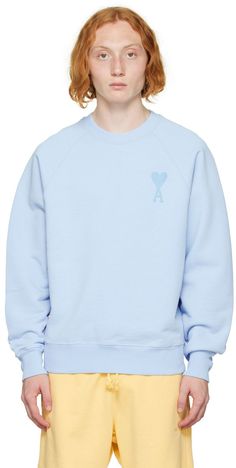 French terry sweatshirt. · Rib knit crewneck, cuffs, and hem · Logo embroidered at front and back Supplier color: Sky blue Blue Crew Neck Sweater With Logo Detail, Blue Long Sleeve Sweatshirt With Logo, Blue Crew Neck Sweats For Spring, Blue Long Sleeve Sweatshirt With Embroidered Logo, Blue Crew Neck Sweatshirt With Embroidered Logo, Blue Sporty Sweater With Embroidered Logo, Blue Ribbed Collar Sweatshirt For Spring, Blue Cotton Sweater With Embroidered Logo, Paris Blue