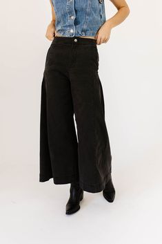 a pair of black wide-leg pants that are sooo good, you’ll never want to take them off. the high-rise + fitted waistline gives it “business casual” charisma, while the flowy loose legs keep things real + relaxed. full of versatility, you can dress them up or down for any occasion. black // wide leg, high waisted, one button zip fly, belt loops, pockets paired with our matilda mesh top + lover denim vest model is 5'8" + wearing a small measurements are approximate + taken while laying flat small : Black Wide Leg Pants, Denim Vest, Spandex Fabric, Matilda, Mesh Top, Leg Pants, Business Casual, Wide Leg Pants, Jumpsuit Dress