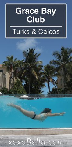 a woman swimming in a pool with palm trees behind her and the words grace bay club turks & calcos