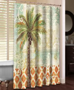 a shower curtain with a palm tree on it