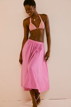 Found: the *perfect* midi skirt from our free-est collection, featured in a classic A-line fit and effortless pull-on design. **Fit:** Mid-rise, billowy A-line silhouette **Features:** Elastic waistband for pull-on ease, pleating throughout, side pockets, soft poplin fabrication **Why We ❤ It:** Sleek with ballet flats or off duty with sporty sneakers, this style has endless ways to wear. | Lowen Midi Skirt by free-est at Free People in Pink, Size: XS Clothing Line Ideas, Midi Skirts Style, Line Ideas, Midi Skirt Outfit, Travel Capsule, Sporty Sneakers, Spring 2023, France Travel, Clothing Line