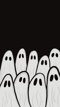 a group of ghost like figures standing in the middle of a black and white background