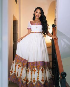 This exquisite Habesha dress, featuring a stunning design, is perfect for weddings and special occasions. Crafted with traditional Ethiopian elegance, this Habesha Kemis blends rich cultural heritage with modern style, making it a standout choice for any event. Material Cotton Menen Thread Estimated delivery : 1 week to 2 weeks Contact WhatsApp +1(304)-306-2784Email: contact@ethiopian.store Habesha Dress Modern, Ethiopian Wedding Dress, Ethiopian Wedding, Habesha Dress, Ethiopian Dress, Habesha Kemis, Dress Modern, Cultural Events, Modern Dress