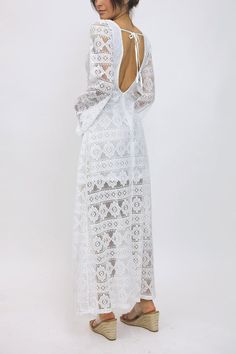 Peasant sleeve lace maxi dress with open back ONLY AVAILABLE IN BLACK Flowy Lace Maxi Dress For Evening, Elegant Beach Maxi Dress With Lace-up Back, Elegant Maxi Dress With Lace-up Back For Beach, Spring Maxi Dress With Scalloped Lace, Elegant Backless Dress With Smocked Back For Vacation, Elegant Lace-up Backless Dress For Beach, Backless Lace Dress For Brunch, Summer Maxi Dress With Scalloped Lace, Summer Beach Maxi Dress With Scalloped Lace