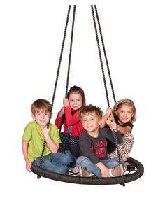 a group of children sitting on top of a black swing frame hanging from the ceiling