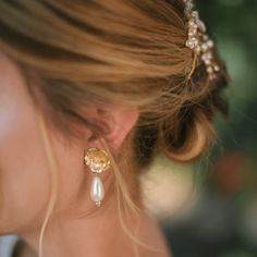 The Sabina pearl drop wedding earrings are the perfect finishing touch for a classic to modern look. Pair the Sabina with feminine and romantic silhouettes and structured gowns. The perfect pair to capture the essence of the modern romantic. Details Hand made in our studio 1 1/2 inches by 3/4 inch Lightweight Please allow 2 weeks for delivery Photography credits: Anne Casey Photography Feminine Pearl Drop Earrings For Evening, Feminine Evening Pearl Earrings, Feminine Pearl Earrings For Evening, Chic Wedding Pearl Drop Earrings, Chic Wedding Drop Pearl Earrings, Chic Pearl Embellished Earrings For Wedding, Chic Pearl Drop Earrings For Wedding, Elegant Formal Bridal Accessories With Pearl Drop, Elegant Bridal Accessories For Anniversary