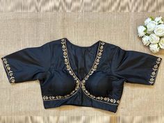 Buy black v-neck saree blouse online in USA with embroidery. Elevate your saree style with exquisite readymade saree blouses, embroidered saree blouses, Banarasi sari blouse, designer saree blouse, choli-cut blouses, corset blouses from Pure Elegance Indian fashion store in USA.-front V Neck Saree Blouse, Hand Embroidery Saree, Designer Saree Blouses, Saree Blouses Online, Blouse Designer, Corset Blouse, Black Pure, Readymade Saree, Saree Blouses