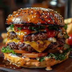 a cheeseburger with lettuce, tomato and onions on a wooden cutting board