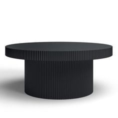 a black round table with pleated edges on an isolated white background, viewed from the front