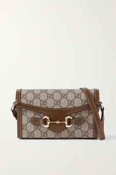 Shop GUCCI Horsebit 1955 leather-trimmed printed coated-canvas shoulder bag, Explore the latest GUCCI women's collection today on NET A PORTER