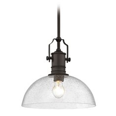 an old fashioned light fixture with a glass dome hanging from the ceiling, against a white background