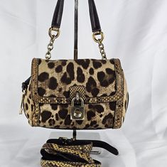 Pre Owned D&G Bag, Used Normal In Good Condition, Signs Of Use On The Exterior And Interior, Overall In Usable Condition. See Pictures Posted For Reference Due To Storage There Is A Slight Smell Dog & Smoke Free Home Luxury Leopard Print Shoulder Bag With Gold-tone Hardware, Luxury Leopard Print Top Handle Bag, Designer Leopard Print Travel Bag, Designer Rectangular Bag In Leopard Print, Designer Leopard Print Bag For Everyday Use, Designer Leather Bags In Leopard Print, Luxury Leopard Print Bag With Removable Pouch, Luxury Leopard Print Shoulder Bag With Double Handle, Luxury Leopard Print Satchel Bag