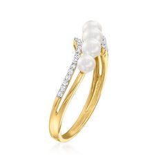 Ross-Simons - 3-4mm Cultured Pearl, .10ct t. w. Diamond Wave Ring in 14kt Yellow Gold. Size 5. Petite 3-4mm cultured freshwater pearls curve across the finger, held by glistening .10 ct. t. w. diamonds in a polished 14kt yellow gold setting. A glamorous bauble for your collection! Diamond and pearl wave ring. Pearl birthstones are the perfect gift for June birthdays. Fine Jewelry Pearl Ring With Diamond Accents, Diamond-accented Pearl Promise Ring, Diamond Pearl Promise Ring, Fine Jewelry Pearl Ring With Diamond Accents For Anniversary, Anniversary Pearl Ring With Single Cut Diamonds, Yellow Gold Pearl Ring With Diamond Accents, 14k Gold Pearl Ring With Diamond Accents For Anniversary, Yellow Gold Pearl Ring With Diamond Accents For Promise, Pearl Birthstone