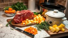 raw meat and vegetables on cutting board next to slow cooker