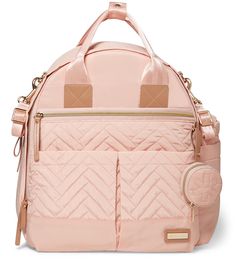 a pink handbag with two compartments on the front and one compartment in the back