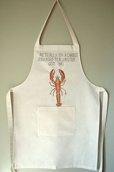 a white apron with a lobster on it