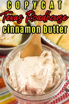 a spoon in a glass bowl filled with cinnamon butter