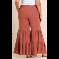 New Umgee Linen/Cotton Blend Pants With Pockets. Color- Canyon Clay Casual Flare Bottoms With Ruffles, Casual Ruffled Flare Bottoms, Casual Cotton Bottoms With Ruffle Hem, Summer Wide Leg Bottoms With Ruffle Hem, Casual Ruffled Trousers, Casual Wide Leg Bottoms With Ruffle Hem, Summer Flare Bottoms With Ruffles, Ruffled Bottoms For Fall Day Out, Chic Ruffled Pants For Day Out