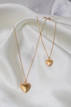 Personalized heart-shaped photo locket necklace - 18K gold plated - a treasured keepsake for her or a gift for her. Small Heart: 1.33cm/ 0.52in Big Heart: 1.9cm/ 0.78in Chain 26cm/ 10in Gold Locket Charm Necklace For Valentine's Day, Gold Plated Heart Jewelry For Anniversary, Heart Shaped Gold Plated Jewelry For Anniversary, Gold Plated Heart Shaped Jewelry For Anniversary, Gold Plated Heart Pendant Locket, Gold Plated Heart Pendant Locket Jewelry, Gold-tone Heart Necklace For Anniversary, Heart-shaped Gold Plated Jewelry For Anniversary, Gold Locket Necklace With Clavicle Chain As Gift