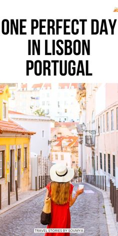 a woman in a red dress and white hat walking down the street with text overlay that reads one perfect day in lisbon portugal