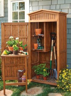 a wooden garden shed with gardening tools in it