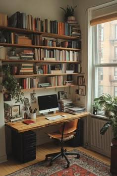 a home office with bookshelves full of books