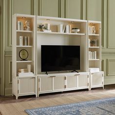 a large entertainment center with bookshelves and shelves