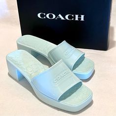 Coach Scarlett Rubber Block Heel Sandals Size 10 Sea Mist (Green/Blue) These Cute Block Heel Rubber Sandals Will Be Your Go-To-Sandal For The Warmer Months: - Rubber Material, With A Gloss Finish - Textured Coach “C” Logo Footbed - Ridge Soles - Square Toe - Single Strap With Coach Badge Logo Embossed On It - Heel Height Approximately 2.25”; Platform Approximately 1” - Color: Sea Mist (This Is A Pale Green/Blue Color) - Size Is 10 - Note: Also Available In Black Size 9 (See Last Pic And My Other Chic Slip-on Coach Heels, Coach Closed Toe Heels For Spring, Coach Block Heel Spring Heels, Coach Block Heel Heels For Spring, Coach Summer Block Heel Shoes, Coach Summer Heels With Heel Strap, Coach Summer Block Heels, Coach Open Toe Heels For Spring, Coach High Heel Sandals For Spring