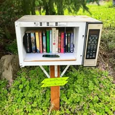 there is a book shelf with books in it