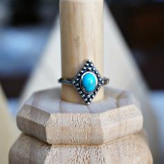 "Handcrafted by Sowell Jewelry, this eye-catching statement ring embellished with beautiful gemstone, oxidized sterling silver gives it an antique look. Solid 925 sterling silver Genuine Turquoise / White Agate /Rhodochrosite Size: adjustable band, fits all sizes Stamped with \"925\" and \"SJ\" Rhodochrosite is a strong and beautiful stone to help with all types of healing of the heart. This stone resonates purity and brings sublime joy and happiness to the wearer. Official site: www.sowelljewel Bohemian Turquoise Rings With Gemstone Accents, Bohemian Adjustable Crystal Ring With Gemstone Accents, Turquoise Bohemian Rings With Gemstone Accents, Adjustable Turquoise Ring With Stone Setting, Adjustable Turquoise Birthstone Jewelry, Spiritual Turquoise Ring Jewelry, Unique Turquoise Ring With Gemstone Accents As Gift, Unique Turquoise Ring With Gemstone Accents, Adjustable Bohemian Turquoise Ring With Stone Setting