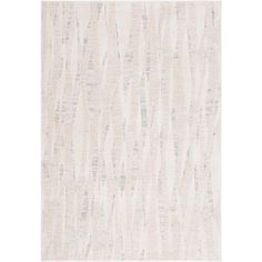 a white rug with wavy lines on it