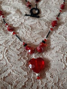 Bead and Chain Red and Black Single Strand Handmade Beaded Necklace with Heart Pendant Heart Shaped Beads For Jewelry Making, Red Beaded Chain Necklace For Valentine's Day, Valentine's Day Beaded Party Necklace, Heart Beaded Necklaces For Parties, Heart Pendant Beaded Necklace For Parties, Heart-shaped Beaded Necklace For Parties, Heart-shaped Faceted Beads Necklace For Gift, Heart-shaped Necklace With Faceted Beads For Gift, Party Beaded Necklace With Heart Pendant