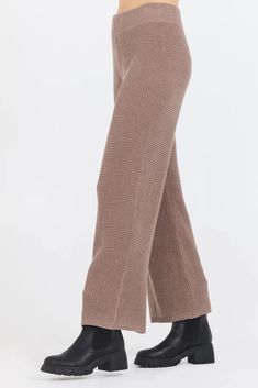 Experience stylish comfort with our Heather Brown Waffle Knit Flared Pants! Made from a soft, breathable knit fabric, these pants are perfect for a casual day out or a cozy night in. The flared design adds a touch of elegance and versatility to your wardrobe. *Our model is 5'9" Ribbed Wide Leg Pants For Fall, High-waisted Ribbed Wide Leg Pants For Fall, Trendy Wide Leg Pants For Winter Loungewear, Elegant Knit Bottoms For Workwear, Elegant Wide Leg Pants For Winter Loungewear, Comfortable Wide Leg Full Length Pants For Fall, Elegant Knit Bottoms For Winter, Elegant Knit Pants For Loungewear, Elegant Ribbed Pants For Fall