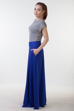 Long blue skirt with pockets from comfy jersey fabric. Skirt length 105 centimeters.Model wears size US 6, she is 160 cm tall with 10 cm heels. Her skirt is 105 cm longPlease, use this size chart to select your sizeUS 0 >>> Bust 82 cm (32.5 inches) Waist 64 cm (25 inches) Hips 89 cm (35 inches)US 2 >>> Bust 85 cm (33.5 inches) Waist 66 cm (26 inches) Hips 92 cm (36 inches)US 4 >>> Bust 88 cm (34.5 inches) Waist 68 cm (27 inches) Hips 94 cm (37 inches) US 6 >>> Full Length Skirt With Elastic Waistband For Work, Modest Fitted Skirt, Modest Full Skirt With Lining, Modest Fitted Skirt Bottoms, Full Length Maxi Skirt With Pockets For Work, Full Length Stretch Gathered Skirt Bottoms, Full-length Maxi Skirt With Pockets For Workwear, Stretch Full Length Gathered Skirt Bottoms, Stretch Full Skirt With Pockets