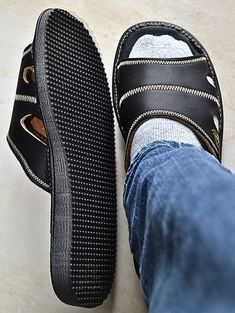 Step into comfort and style with our Men's Black Sandals. These versatile house leather slides are the perfect choice for your summer adventures, whether you're relaxing at home or exploring new destinations. Crafted from high-quality materials, these flip flop slippers offer a blend of durability and sophistication for the modern man. Featuring a wide width design, these slides provide ample room and comfort for every foot shape. The cushioned footbed and leather insole ensure a plush feel with Toe Slippers, Open Toe Slippers, Stylish Sandals, Outdoor Summer, Flip Flop Slippers, Summer Adventures, Leather Slides, House Slippers, Mens Slippers