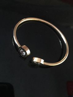 This beautiful luxury crystal stainless steel minimal roman numeral bangle cuff bracelet jewelry will not fade. Great women fashion minimalist wrap for any night out or special occasions, such as weddings, bridal parties, proms or clubbing. Cute addition to your stacked bands. This delicate designer expensive looking minimal ladies jewel, is also a great gift for your friend girlfriends or lover. Available in rose gold, gold or silver. Bracelets Type: BanglesPlating: Gold-colorMaterial: CrystalS Luxury Trendy Bangle Cuff Bracelet, Luxury Designer Bangle With Bracelet Strap, Luxury Stainless Steel Bracelet Strap Jewelry, Luxury Party Cuff Bracelet, Luxury Bracelet With Decorative Band As Gift, Luxury Jewelry Bracelet With Decorative Band, Luxury Gold Plated Silver Cuff Bracelet, Luxury Gold Cuff Bracelet For Anniversary, Luxury Cuff Bracelet For Anniversary