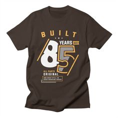 a brown t - shirt with the number 75 on it