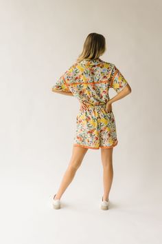 The Reynolds Drawstring Shorts has a flexible waistline with a fun + colorful floral print. These shorts have hidden side pockets + a relaxed fit. They are a versatile + comfortable everyday option. Pair with The Lively Button Up Blouse to make it a set. Details Model is wearing a small self/lining: 100% polyester Fabric Care Guide Here Sizing & Fit Measurements are approximate and taken while laying flat across the front. Not doubled. x-small: waist = 12"; length = 15" small: waist = 13"; lengt