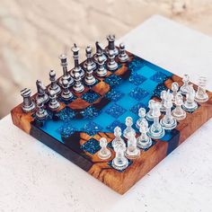 Handmade Small Chess set made of wood and epoxy resin|Blue resin chessboard|Chess pieces resin|Wooden Chessboard|Board Game|Vip Gift for him Made of oak root wood, the color of the inserts and cells can be any; - It is possible to manufacture in a larger size; the price is for the size shown below; - Field size: 20x20 cm, figures height: 3-6 cm Epoxy Chess Board, Pearl Ex, Wooden Chess Pieces, Wood Games, Epoxy Resin Crafts, Wooden Chess, Diy Games, Resin Ideas, Chess Pieces