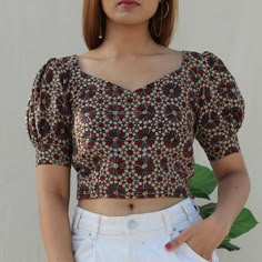 "Discover the art of effortless chic with an English blouse. Versatile, comfortable, and always in style. 🌟 #ChicStyle #EnglishBlouse #FashionEssentials #VersatileFashion #ClassicLook" Crop Kurti Design, Crop Top Hands Design, Ethnic Tops For Women, Crop Top Neck Designs, Simple Crop Top Designs, Cotton Crop Tops Designs For Jeans, Printed Cotton Crop Top, Crop Top Stitching Ideas, Ethnic Crop Top Designs