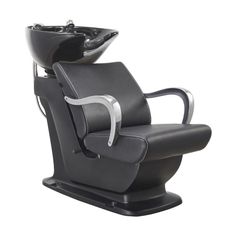 a black chair with chrome trimming on the armrests and foot rest in front of a white background