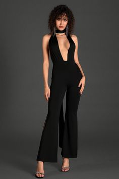 Grace the occasion in our hollow backless jumpsuit, a captivating ensemble designed to elevate your style with grace and sophistication. This jumpsuit features intricate hollow back detailing and draped ribbon, adding a touch of allure to your wardrobe. Handmade customization Fabric composition: 90% polyester fiber, 10% spandex Washing method: hand wash or dry clean Popular elements: hollow Chic V-neck Jumpsuits And Rompers For Gala, Chic Summer Jumpsuits And Rompers For Gala, Solid Color Backless Bodysuit For Date Night, Evening Backless Jumpsuits And Rompers, Backless Evening Jumpsuits And Rompers, Solid Backless Bodysuit For Date Night, Backless Solid Bodysuit For Date Night, Backless Solid Color Bodysuit For Date Night, Sleek Party Bodysuit