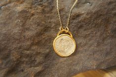 old coin necklace,24k gold pendant, old coin necklace,Ancient Greek Coin, ancient coin jewelry, unique gold pendant, 24k solid gold pendant done with 24k gold, this unique piece will make anyone that wears it happy. i know i like them very much. i am wearing one right now. the chain is made out of 14K gold , about 18 inches (45 cm) . coin is 18 mm diameter 14k gold . solid gold. 24k solid gold is a lifetime jewelry, with just the perfect look . can be worn daily and over night for those who neve Elegant Handmade Coin Necklace, Handmade Elegant Coin Necklace, Ancient Style Yellow Gold Necklace With Coin Pendant, Ancient Yellow Gold Coin Pendant Jewelry, Ancient Style Coin Pendant Necklace For Gift, Handmade Yellow Gold Coin Amulet Necklace, Handmade Gold-plated Coin Pendant Necklace, Handmade Gold Coin Amulet Necklace, Ancient Gold Coin Necklace