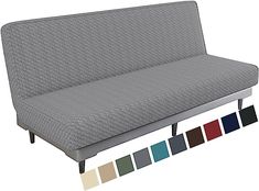 a gray couch with four different colors on the bottom and one is black, white, red, blue, green, yellow