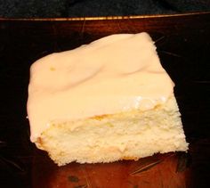 a piece of cake sitting on top of a wooden table