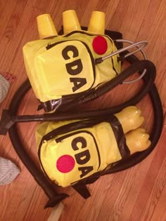 two backpacks made to look like corn dogs