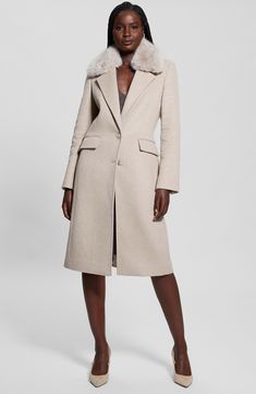 A wool-kissed staple coat gives you the option to push up the plush factor by adding a faux fur collar whenever it suits your mood. Front button closure Notched collar with removable faux fur Three-button cuffs Front flap pockets Back belt Back vent Lined 39% polyester, 35% recycled polyester, 18% wool, 3% viscose, 3% acrylic, 1% cotton, 1% polyamide with 100% polyester faux fur Hand wash, dry flat Imported Chic Beige Wool Fur Coat, Chic Wool Fur Coat With Faux Fur Trim, Long Wool Coat With Faux Fur Trim For Work, Workwear Long Wool Coat With Faux Fur Trim, Wool Fur Coat With Faux Fur Trim For Work, Chic Wool Coat With Faux Fur Trim For Work, Beige Wool Outerwear With Faux Fur Trim, Chic Winter Coat, Winter Coat Dress