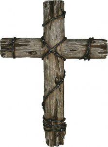 a wooden cross that is tied up with some kind of rope on it's side