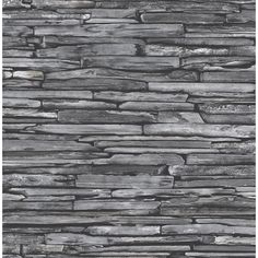 a stone wall that has been made out of wood