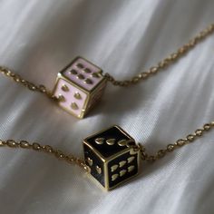 Lucky Dice Necklace, Pink Dice Jewelry, Black Dice Necklace, Gift for Her, Aesthetic Jewelry for Her, Pink Jewelry, Layering Necklace ☽ 18K Gold Plated, Enamel Dice Bead (9x9mm) ☽ This is a gold plated charm meaning that it requires extra care to keep its shine and color intact. Please follow these tips to make the charm last longer in its original condition: avoid wearing it to the beach, pool, shower, bathtub, hot tub; avoid it touching any lotions, creams, or sweat; take it off before going t Fun Trinkets, Dice Aesthetic, Dice Cage Necklace Diy, Pink Dice Aesthetic, Dice Jewelry, Dice Necklace, Gold Dice Earrings, 20 Sided Dice Earrings, Lucky Jewelry